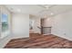 Bonus room featuring beautiful wood floors, natural lighting, and stairwell access to the home's other levels at 507 Yucatan Dr # 71, Waxhaw, NC 28173