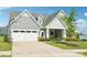 Charming single-Gathering home with a lush green lawn, two-car garage, gray siding, and inviting curb appeal at 507 Yucatan Dr # 71, Waxhaw, NC 28173
