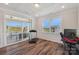 Bright home gym/flex room with hardwood floors, natural light, and access to outdoor patio at 507 Yucatan Dr # 71, Waxhaw, NC 28173