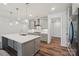 Kitchen with white countertops, gray cabinets, subway tile backsplash, and stainless steel appliances at 507 Yucatan Dr # 71, Waxhaw, NC 28173