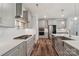 Kitchen showcasing stainless steel appliances, large island, and gray cabinets at 507 Yucatan Dr # 71, Waxhaw, NC 28173