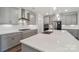 Kitchen with large island, stainless steel appliances, and gray cabinets at 507 Yucatan Dr # 71, Waxhaw, NC 28173