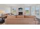 Bright living room with a fireplace, hardwood floors, and comfortable seating, perfect for relaxation at 507 Yucatan Dr # 71, Waxhaw, NC 28173