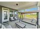 Covered patio with outdoor seating, swing, and views of the landscaped backyard at 507 Yucatan Dr # 71, Waxhaw, NC 28173