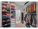 Spacious walk-in closet with custom shelving and storage options, connects to laundry room at 507 Yucatan Dr # 71, Waxhaw, NC 28173