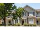 Charming townhouse with a welcoming front yard featuring lush greenery and a well-maintained lawn at 514 Bent Leaf Ct, Fort Mill, SC 29708