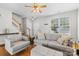 Comfortable living room featuring hardwood floors, neutral tones, and plenty of natural light at 514 Bent Leaf Ct, Fort Mill, SC 29708
