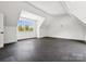 Large bonus room with a window for natural light and plenty of open space, suitable for multiple uses at 5311 Carmel Park Dr, Charlotte, NC 28211