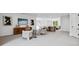 Spacious living room featuring modern decor, comfortable seating, and an open floor plan at 5311 Carmel Park Dr, Charlotte, NC 28211