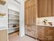 A beautifully designed pantry features custom cabinets and ample shelving space at 5311 Carmel Park Dr, Charlotte, NC 28211