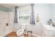 Bathroom with tile floor and bath-shower combo at 559 15Th Se Ave, Hickory, NC 28602