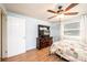 Bedroom with laminate wood floor and large window at 559 15Th Se Ave, Hickory, NC 28602