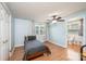 Bedroom with laminate wood flooring and view to the bathroom at 559 15Th Se Ave, Hickory, NC 28602