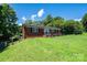 Charming brick home with lush green lawn and black shuttered windows at 559 15Th Se Ave, Hickory, NC 28602