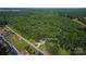 Aerial view of property highlighting the landscape, road frontage and wooded surroundings at 7032 Waxhaw Hwy, Lancaster, SC 29720