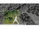 Aerial view of property outlining boundaries and highlighting the wooded surroundings and driveway at 7032 Waxhaw Hwy, Lancaster, SC 29720
