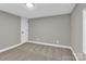 This bedroom has neutral walls, carpeting, and a window at 7032 Waxhaw Hwy, Lancaster, SC 29720