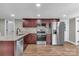 Modern kitchen with stainless steel appliances, granite countertops, and ample cabinet space at 7032 Waxhaw Hwy, Lancaster, SC 29720