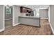 Open-concept kitchen with island and stainless steel appliances at 7032 Waxhaw Hwy, Lancaster, SC 29720