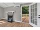 Living room with fireplace and access to deck at 7032 Waxhaw Hwy, Lancaster, SC 29720