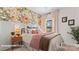 Charming bedroom with floral wallpaper, cozy bedding, and natural light at 728 Falling Oak Aly # 21, Huntersville, NC 28078