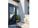 Cozy patio space with modern furniture and sleek, dark-framed windows at 728 Falling Oak Aly # 21, Huntersville, NC 28078