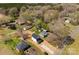 Bird's eye view of a property in a suburban neighborhood surrounded by trees at 925 Marys Grove Rd, Cherryville, NC 28021