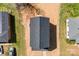 Aerial view of dark roof on top of tan property with grass and cars at 925 Marys Grove Rd, Cherryville, NC 28021