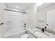 A bathroom with granite countertops, matte black fixtures, and a shower-tub combo at 925 Marys Grove Rd, Cherryville, NC 28021