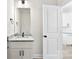 Bathroom featuring a vanity with granite countertop and sleek fixtures at 925 Marys Grove Rd, Cherryville, NC 28021