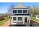 A well-maintained two-story home with a welcoming front porch and mature landscaping at 925 Marys Grove Rd, Cherryville, NC 28021