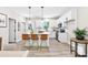 Modern white kitchen featuring a center island with barstool seating at 925 Marys Grove Rd, Cherryville, NC 28021