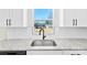 Modern kitchen sink with granite countertops, subway tile backsplash and stainless steel appliances at 925 Marys Grove Rd, Cherryville, NC 28021