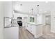 Bright, modern kitchen featuring a granite island and stainless steel appliances at 925 Marys Grove Rd, Cherryville, NC 28021