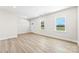 Bright, freshly painted living area with modern floors and sunlit windows at 925 Marys Grove Rd, Cherryville, NC 28021