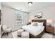 Comfortable bedroom with soft natural lighting and neutral decor at 925 Marys Grove Rd, Cherryville, NC 28021