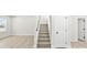 Carpeted staircase with wood handrail and white trim, leading to the upper level at 925 Marys Grove Rd, Cherryville, NC 28021