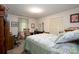 Tranquil bedroom with a comfortable bed, desk, and ample closet space at 938 Kannapolis Pkwy, Concord, NC 28027