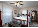 Bedroom featuring a four-poster bed, neutral walls, and natural light from the windows at 938 Kannapolis Pkwy, Concord, NC 28027
