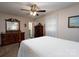 Traditional primary bedroom with a four-poster bed, dresser, and ceiling fan at 938 Kannapolis Pkwy, Concord, NC 28027