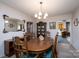 Dining room showing wood table and chairs, cabinets and view of the kitchen at 938 Kannapolis Pkwy, Concord, NC 28027