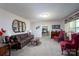 Cozy living room with plush seating, neutral carpet, and decorative mirrors at 938 Kannapolis Pkwy, Concord, NC 28027