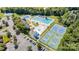 Aerial view of the community amenities including pools, tennis courts, playground and parking at 9644 Marquette Nw St, Concord, NC 28027