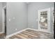 Inviting room with modern gray walls and a door to the outside at 9644 Marquette Nw St, Concord, NC 28027