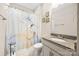 Cozy bathroom featuring a granite countertop, neutral color scheme, and decorative artwork at 1108 Mayapple Way, Belmont, NC 28012