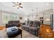 Open concept living space seamlessly connects the living room to the kitchen and dining area at 1108 Mayapple Way, Belmont, NC 28012