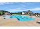 Community pool featuring a lap pool, poolside lounge chairs, and a clubhouse in a well-maintained neighborhood at 1108 Mayapple Way, Belmont, NC 28012
