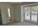 Bedroom showing bright window and mirrored closet door, enhancing the sense of space at 11123 Harrowfield Rd, Charlotte, NC 28226