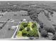 An aerial view of the property showcasing the approximate lot lines and surrounding landscape at 1173 Cat Square Rd, Vale, NC 28168