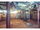 Unfinished basement with exposed piping, ductwork, and concrete floor at 1173 Cat Square Rd, Vale, NC 28168